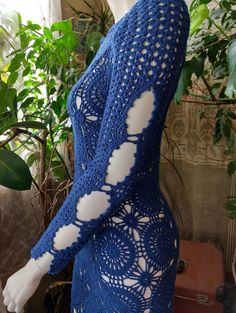 Blue Lace Crochet Top, Blue Crochet Lace Top, Blue Fitted Crochet Lace Dress, Fitted Blue Crochet Lace Dress, Fitted Blue Crochet Dress, Hand Knitted Bohemian Crochet Top, Fitted Lace Crochet Dress For Festival, Bohemian Long Sleeve Crochet Lace Dress, Blue Fitted Long Sleeve Crochet Top