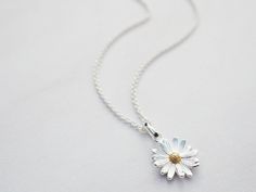 This Pendant Necklaces item by tinysilver has 370 favorites from Etsy shoppers. Ships from United Kingdom. Listed on Jun 19, 2024 Dainty Daisy Necklace For Gift, Dainty Daisy Sterling Silver Jewelry, Silver Daisy Jewelry Gift, Silver Daisy Jewelry For Gift, Daisy Pendant, Daisy Necklace, Gold Details, Matching Earrings, Sterling Silver Chains