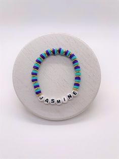 a beaded bracelet with the word'awesome'written on it