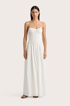 A delicate maxi dress crafted from 100% organic cotton. It has dainty straps, adjustable in length, a gathered bust detail and channelled elastic waist that falls into a soft, semi-flared skirt. Lightweight and offering significant stretch, it is a chic and comfortable addition to your summer wardrobe. Maxi Dress White, Maxi Dress Sale, Faithfull The Brand, Dress Crafts, White Maxi, White Midi Dress, Flared Skirt, White Maxi Dresses, Event Dresses