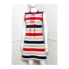 1960s vintage mod striped mini dress by Vicky Vaughn. Stretchy white ribbed poly with horizontal stripes in red, navy and tan. Scoop neckline with red trim. Lace up front with brass grommets. Mini length. Nylon zipper at the back. No lining.  { LABEL- FABRIC- TAG SIZE } Vicky Vaughn Poly No size tags { MEASUREMENTS } Shown on a 5'8" Mannequin with 33" Bust- 25" Waist- 35" Hips  Bust- 34" to 38" Waist- 32" Hips- 38" to 42" Total Length- 34" { CONDITION } Excellent Condition PLEASE READ BEFORE PURCHASING For best fit, please compare measurements to a garment of your own that fits comfortably and please measure yourself before completing your purchase. It is normal for humans measurements to fluctuate.  I cannot accept returns if the garment does not fit you as expected. Please be aware of th Retro Striped Mini Dress, Mod Mini Dress, Striped Mini Dress, Horizontal Stripes, Fabric Tags, 1960s Vintage, Dress Clothes For Women, Bleu Marine, Vintage Outfits