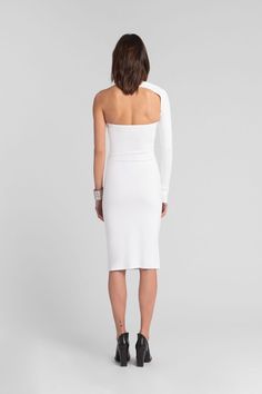 Elegance meets edge. Welcome to the iconic silhouette that put our brand on the map. The Manhattan, here in an asymmetric midi dress design, is as flattering as it is captivating, defined by a halter neckline that continues to an elegant long sleeve framing an open back. Fashioned from our structured, mid-stretch European ponte for the perfect all-day-or-night fit. Need help putting it on? Watch the tutorial.[SPLIT] Sam, in off white and in black, is 5'8" (173 cm) tall, wearing size XS. Natalia, One Shoulder Midi Dress, Designer Midi Dresses, Red Midi Dress, Asymmetrical Design, Long Sleeve Midi Dress, Halter Neckline, Dress Design, Black Midi Dress, Black Mesh