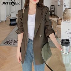 Brand Name: BGTEEVEROrigin: CN(Origin)Season: Spring/AutumnStyle: CasualDecoration: ButtonPattern Type: SolidClothing Length: LongAge: Ages 18-35 Years OldCollar: NotchedClosure Type: Double BreastedItem Type: BlazersMaterial: PolyesterMaterial: COTTONSleeve Length(cm): FullSleeve Style: RegularThickness: STANDARDHooded: NoRelease Date: Autumn Model Number: BY5785Gender: WOMENFabric Type: Polyester CottonClothing Patterns: LOOSEMaterial Composition: Natural fiberFabric content: 96% and abovegend Female Blazer, Female Suit, Mid Calf Dresses, Drawstring Dresses, Oversize Women, Women's Robe, Women Jacket, Crop Top Blouse, Suits Coats