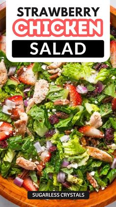 strawberry chicken salad in a wooden bowl with text overlay