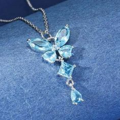 Elevate Your Fashion Statement And Add A Touch Of Elegance To Your Outfit With This Stunning Butterfly Pendant Necklace From Shein. The Necklace Features A Beautiful Butterfly-Shaped Pendant Adorned With Blue Cubic Zirconia Stones That Sparkle Under Any Light. Made Of High-Quality Stainless Steel, The Necklace Is Sturdy And Durable, Ensuring It Will Last A Long Time. With A Necklace Length Of Approximately 8 Inches Plus A 2-Inch Extender, It Is Perfect For Any Occasion, From A Casual Day Out To Elegant Blue Crystal Necklace With Clavicle Chain, Elegant Blue Pendant Crystal Necklaces, Elegant Blue Pendant Crystal Necklace, Elegant Blue Crystal Pendant Necklace, Elegant Blue Crystal Necklace For Gift, Elegant Blue Crystal Necklace, Blue Crystal Pendant Necklace With Clavicle Chain, Blue Cubic Zirconia Necklace For Party, Elegant Blue Sterling Silver Crystal Necklaces