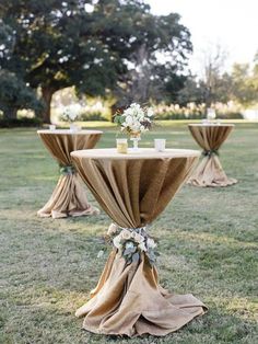 an instagram page with two tables covered in burlocks and flowers on them