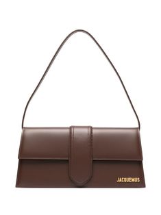 brown calf leather gold-tone logo plaque foldover top with magnetic fastening single shoulder strap internal card slot Jacquemus Shoulder Bag, Jacquemus Bag Brown, Luxury Work Bag, Aesthetic Wallets For Women, Brown Jacquemus Bag, Brown Bag Aesthetic, Brown Designer Bag, Brown Bag Outfit, Jacquemus Bambino