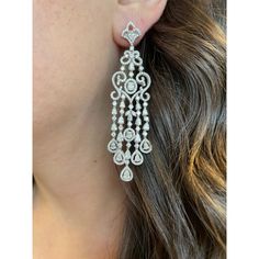 Lovely dangling multi shape diamond chandelier earrings. 642 oval, pear, round, and marques diamonds, 9.60 carats. Approximately G/H color and SI clarity. 18-karat white gold, 25.95 grams, 3in. Accommodated with an up-to-date digital appraisal by a GIA G.G. once purchased, upon request. Please contact us with any questions. Diamond Earrings 1stdibs, Diamond Chandelier Earrings, Diamond Chandelier, G H, Chandelier Earrings, Pear, Diamonds, White Gold, Gold