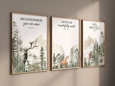 three framed art prints on the wall with trees and mountains behind them, each featuring a deer