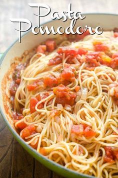 pasta with tomato sauce in a green pan on a wooden table and text overlay