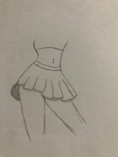 a pencil drawing of a dress on paper