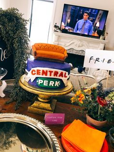 a table topped with lots of different types of furniture and decor on top of a wooden table