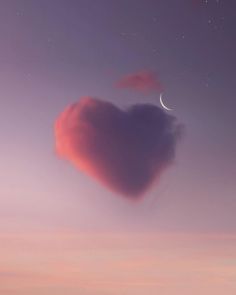 a heart shaped cloud floating in the sky with a crescent moon and stars above it