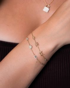 The item on everyone's wishlist this season: our new Charm Bracelet. Customizable Charm Bracelet, Gold Charm Bracelet, Chain Design, Diamond Charm, Disc Necklace, Initial Charm, Wedding Wear, Gold Charm