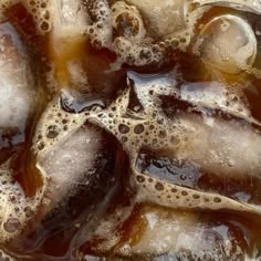 ice cubes with brown liquid in it