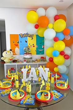 a pokemon themed birthday party with balloons and decorations