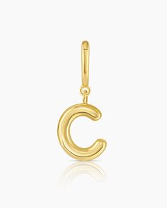 Description Personalize your favorite chain necklace with this playful helium alphabet charm. Wear your initials or a loved one's - you can make a set here. Product Details Total drop 11/16" Letter measures 5/16" by 3/8" Hinge closure measures 3/16" by 5/16" Available in 18k gold plated brass Avoid contact with anything containing derivatives of alcohol Everyday Gold Charms, Tarnish Resistant, Everyday Yellow Gold Pendant Charms, Everyday Tarnish-resistant Gold Charms, Classic Initial Pendant Charm, Gold Initial Pendant Charms, Everyday Initial Pendant Charm With Lobster Clasp, Personalized Gold Charms For Everyday, Gold Sterling Silver Initial Necklace With Charms, Classic Yellow Gold Charm Necklaces With Initials