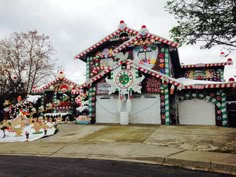 a house decorated with christmas decorations and candy canes