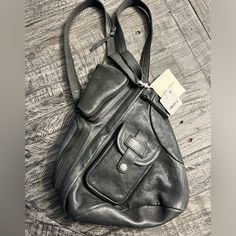 We The Free Sparrow Convertible Sling Bag In Shadow (Dark Gray) Nwt Condition: New With Tags Measurements: Height 13 Depth 4.3 Width 8.7. Originally $178. Sold Out Online This Is Such A Cool Bag. It Can Be Worn As A Sling Or As A Backpack. It Also Has A Handle To Carry It Like A Clutch. It Has So Many Pockets And It Just Looks So Cool. It’s Incredibly Soft And It’s Great For Taking Whatever You Need. I Love The Backpacks Feature So I Can Be Hands Free. This Is A Great Free People Bag! Measuremen Cool Bag, Free People Bags, So Cool, Free Bag, Fun Bags, Sling Bag, Hands Free, Dark Gray, Convertible