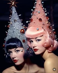 two women with christmas hats on their heads and one has her hair in the shape of a tree