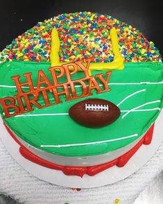 a football themed birthday cake with sprinkles