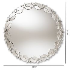 a large round mirror with leaves on the bottom and sides, measurements for each piece