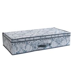 a blue and white floral print storage box