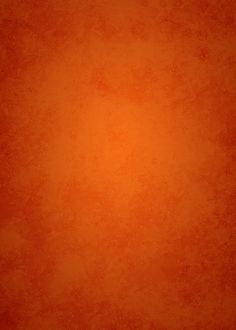 an orange and red background with some light