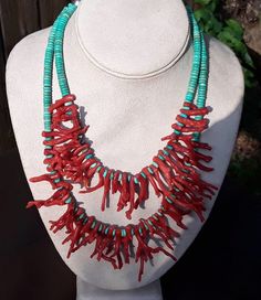 This is a Beautiful made Santo Domingo necklace made with Nevada Turquoise and Mediterranean Branch Coral. The turquoise beads are made with a double strand of Nevada turquoise and Natural Branch coral. The length of the first turquoise strand is 16” and the second strand is 18.5”. The necklace has a Sterling silver hook and eye clasp. The contrasting color of the turquoise complimented with Mediterranean red coral makes this necklace a stand out!The necklace is vintage and was made in the 1990s Unique Turquoise Double Strand Necklace, Handmade Double Strand Turquoise Necklace, Unique Turquoise Double Strand Beaded Necklaces, Turquoise Double Strand Hand-strung Jewelry, Handmade Turquoise Double Strand Jewelry, Handmade Double Strand Turquoise Jewelry, Natural Branches, Seed Bead Jewelry Patterns, Heishi Necklace