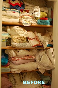 a closet filled with lots of clothes and blankets