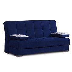 a blue couch with two pillows on it's back and the seat upholstered