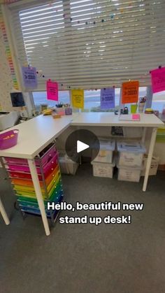 an office desk with lots of colorful sticky notes on it