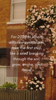 a brick building with white flowers growing on it and the words for 205 to bloom with new possibilities, take the first step, like a seed breaking through the soil