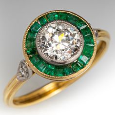 an antique diamond and emerald ring