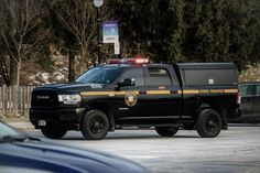 a police truck is parked in the parking lot