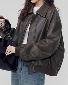 Add a touch of grunge aesthetics to your outfit with our Brown Leather Bomber Jacket Size:• S: Bust: 133cm/ 52.4 in, Length: 58cm/ 22.8 in, Sleeves: 57cm/ 22.4 in• M: Bust: 135cm/ 53.2 in, Length: 59cm/ 23.2 in, Sleeves: 58cm/ 22.8 in• L: Bust: 137cm/ 53.9 in, Length: 60cm/ 23.6 in, Sleeves: 59cm/ 23.2 inMaterial: Vegan Leather Cool Jackets Aesthetic, Leather Jacket Downtown, Dark Academia Jacket, Edgy Classic Style, Leather Jacket Aesthetic, Brown Jacket Outfit, Grunge Sleaze, Casual Jackets For Women, Grunge Aesthetics