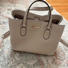 Brand New Barely Used Kate Spade Tote Bag Very Clean Elegant Beige Satchel For On-the-go, Chic Taupe Tote Satchel, Chic Cream Satchel For On-the-go, Neutral Satchel Shoulder Bag For Errands, Kate Spade Top Handle Satchel For On-the-go, Taupe Satchel With Removable Pouch For Shopping, Neutral Satchel With Detachable Strap, Chic Neutral Shoulder Bag With Top Carry Handle, Chic Neutral Shoulder Bag With Top Handle