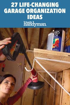 a woman is working on a garage organization