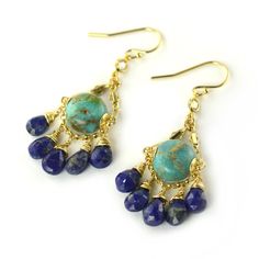 "Natural Turquoise & Lapis Chandelier Earrings Faceted blue lapis with glittering pyrite veins and natural blue-green polished turquoise stones are accented with touches of 14k gold-fill to make these very pretty dangling chandelier earrings. Would make unique \"something blue\" earrings for a lucky bride. 14k gold-filled french earwires. Earrings hang approximately 2 inches in length. These earrings are one of a kind and ready to ship. Made with love and positive intentions." Blue Gemstone Chandelier Earrings For Gifts, Elegant Lapis Lazuli Wire Wrapped Earrings, Elegant Wire Wrapped Lapis Lazuli Earrings, Blue Gemstone Chandelier Drop Earrings, Blue Bohemian Earrings With Gemstone Accents, Dangling Chandelier, Chandelier Earrings Wedding, Positive Intentions, Gold Chandelier Earrings