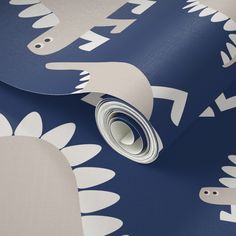 a blue and white wallpaper with an animal design on the bottom half of it