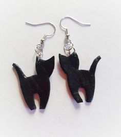 Cute black cat earrings. Handmade from natural leather dangling earrings. Check out more #leatherearrings in my Etsy shop and get free shipping. @fabrictwist Black Cat Earrings, Cute Black Cat, Silhouette Stencil, Pampering Gifts, Sea Glass Earrings, Cute Black Cats, Shiny Things, Amazon Handmade