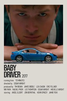 a poster for the movie baby driver with a young man looking at a toy car