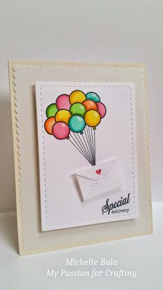 a handmade card with balloons on it