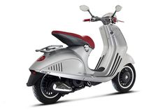 a silver and red scooter on a white background