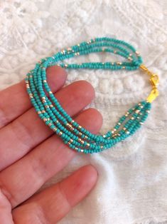 Turquoise and Gold Bracelet Seed Bead Bracelet Teal - Etsy Teal Bracelet, Gold Beaded Bracelet, Beaded Leather Bracelet, Turquoise And Gold, Seed Bead Bracelet, Gold Bead Bracelets, Summer Bracelets, Teal And Gold, Bracelet Beaded