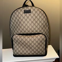 Gucci Print Bookbag Good Condition - Has Some Stains On Inside (See Pictures) N A Lil On The Bottom Pockets Inside Suede Interior Brown N Tan Willing To Negotiate On Price Gucci Standard Everyday Backpack, Gucci Brown Backpack For Daily Use, Gucci Luxury Everyday Backpack, Gucci Luxury Backpack For Everyday, Luxury Everyday Gucci Backpack, Gucci Brown Standard Backpack, Gucci Classic Backpack, Brown Gucci Standard Backpack, Classic Gucci Backpack