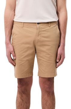 Classic and versatile, these shorts made of soft cotton sport a touch of stretch to keep you moving comfortably day and night. 8 1/2" inseam; 16" leg opening; 9 1/2" front rise; 13" back rise (size 29) Zip fly with button closure Front slant pockets; back button-welt pockets 97% cotton, 3% elastane Machine wash, dry flat Imported Cotton Mid-thigh Length Shorts In Solid Color, Relaxed Fit Bermuda Shorts With 5-inch Inseam, Fitted Cotton Shorts Mid-thigh Length, Fitted Cotton Mid-thigh Shorts, Fitted Cotton Mid-thigh Length Shorts, Cotton Bermuda Shorts With 5-inch Inseam For Summer, Stretch Cotton Bermuda Shorts Mid-thigh Length, Summer Cotton Bermuda Shorts, Fitted Cotton Athletic Shorts With Built-in Shorts