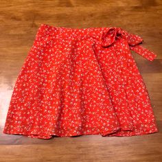 Forever 21 Wrap Skirt Red-Orange Short Skirt W/White & Blue Flowers Nwt Size S The Skirt Is Brand New With Tags. The Front Ties And Buttons For Closure. The Skirt Is Fully Lined. So Cute! Button Down Denim Skirt, White Blue Flowers, Teal Skirt, Satin Mini Skirt, White And Blue Flowers, Tan Skirt, Green Mini Skirt, Blue Denim Skirt, Flower Skirt