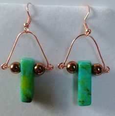 Handcrafted pierced earrings in green jasper stones and copper hematite. These stunning earrings measure 2.0" in length and 1.0" wide. Pierced Green Copper Earrings, Green Copper Pierced Earrings, Green Copper Earrings With Ear Wire, Green Copper Earrings, Green Jasper, Earring Ideas, Jasper Stone, Stunning Earrings, Wire Earrings