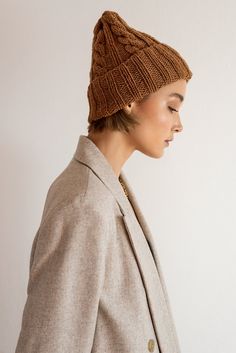 The Classic Cable Hat - our most loved wool beanie. Hand knitted in a warm and soft wool blend. The folded ribbed brim offers extra warmth to your ears and is adjustable so you can wear your beanie as slouchy or as fitted you prefer. Handcrafted in Greece. DETAILS * Adjustable folded brim * Soft wool blend (OEKO-TEX certified - STANDARD 100) * Hand wash in cold water SIZE & FIT * One size, fits most * Custom sizing available upon request COLORS * Here shown in Copper Caramel and Light Grey * Brown Wool Beanie For Fall, Chunky Knit Wool Hat For Fall, Hand Knitted Wool Hats For Fall, Brown Knit Cap Hat, Brown Knit Cap, Brown Chunky Knit Hat For Winter, Hand Knitted Wool Beanie For Fall, Hand-knitted Wool Beanie For Fall, Brown Knitted Hat For Fall